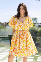 yellow floral mini dress