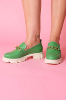 green loafer shoes