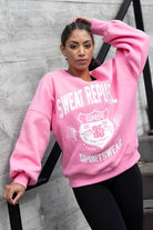 pink sweatshirt sweater