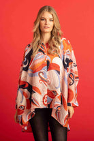 beige top abstract sleeves