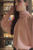 peach blouse