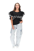 black top with layers of gathered frills white trim ric rac