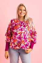 pink floral print V neck top ribbing