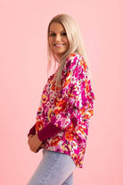 pink floral print V neck top ribbing