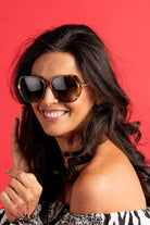 round sunglasses in a brown tortoise shell