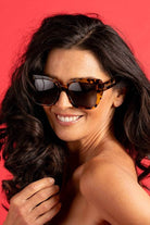 squared-bottom cat eye sunglasses in brown tortoise shell